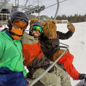 attitash snowboarding bear suit gnarbear skiing rail backyard